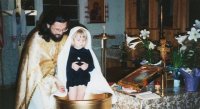 Sacrament of baptism, accomplished by Fr. Oleg